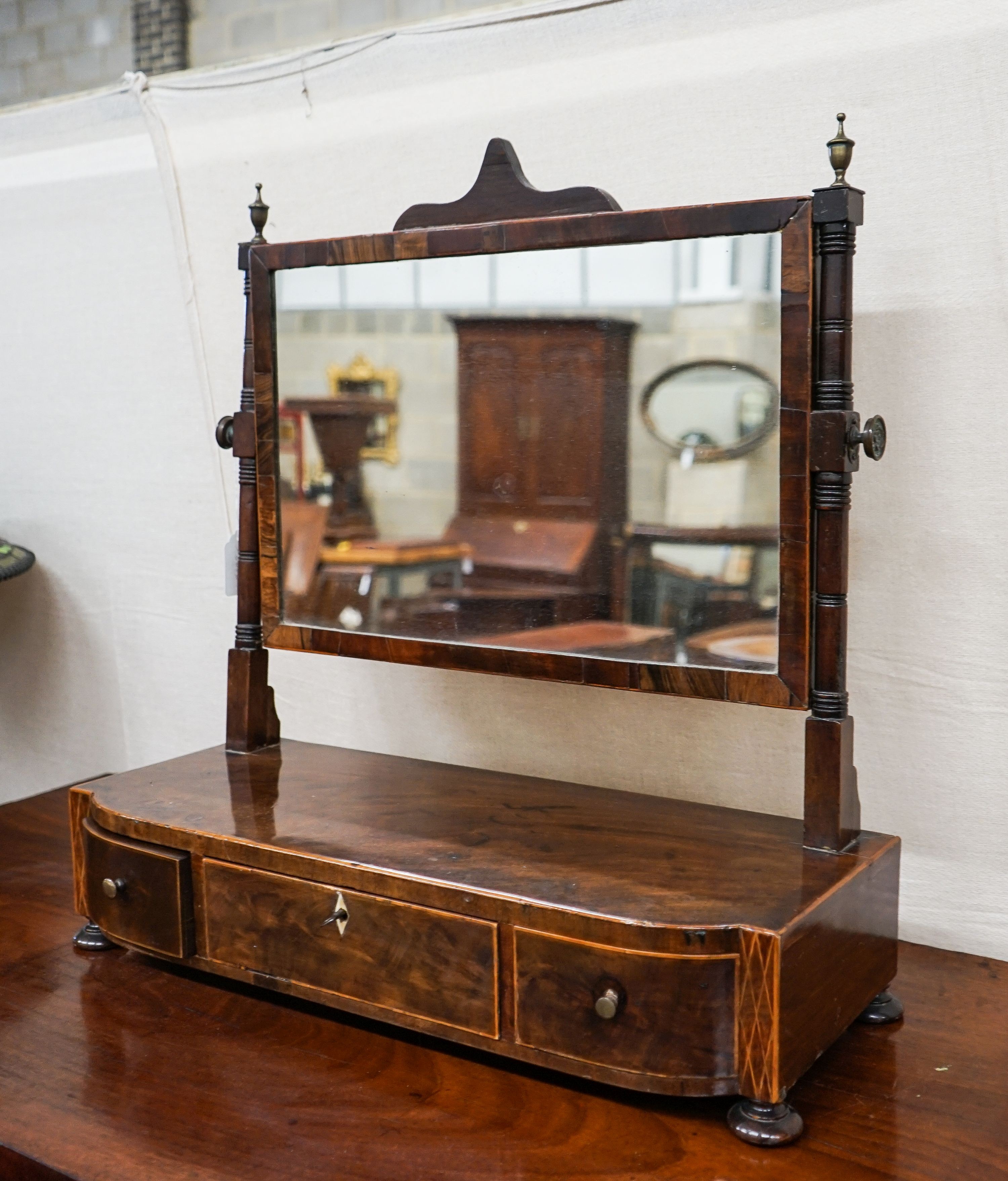A George IV mahogany toilet mirror, with three drawer box base, width 58cm, depth 24cm, height 59cm